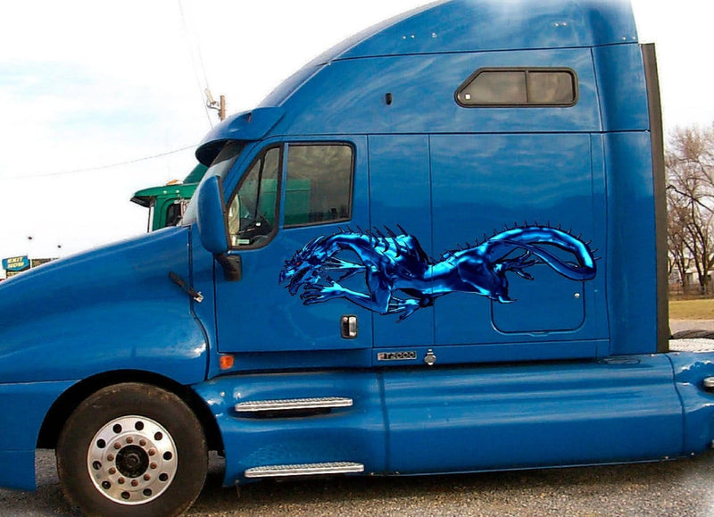 metal blue dragon vinyl graphics on blue semi truck